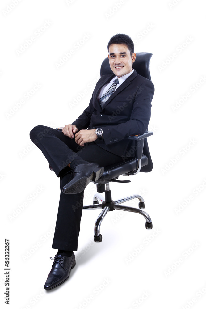 Asian business man sitting on office chair Asian business man sitting on office chair
