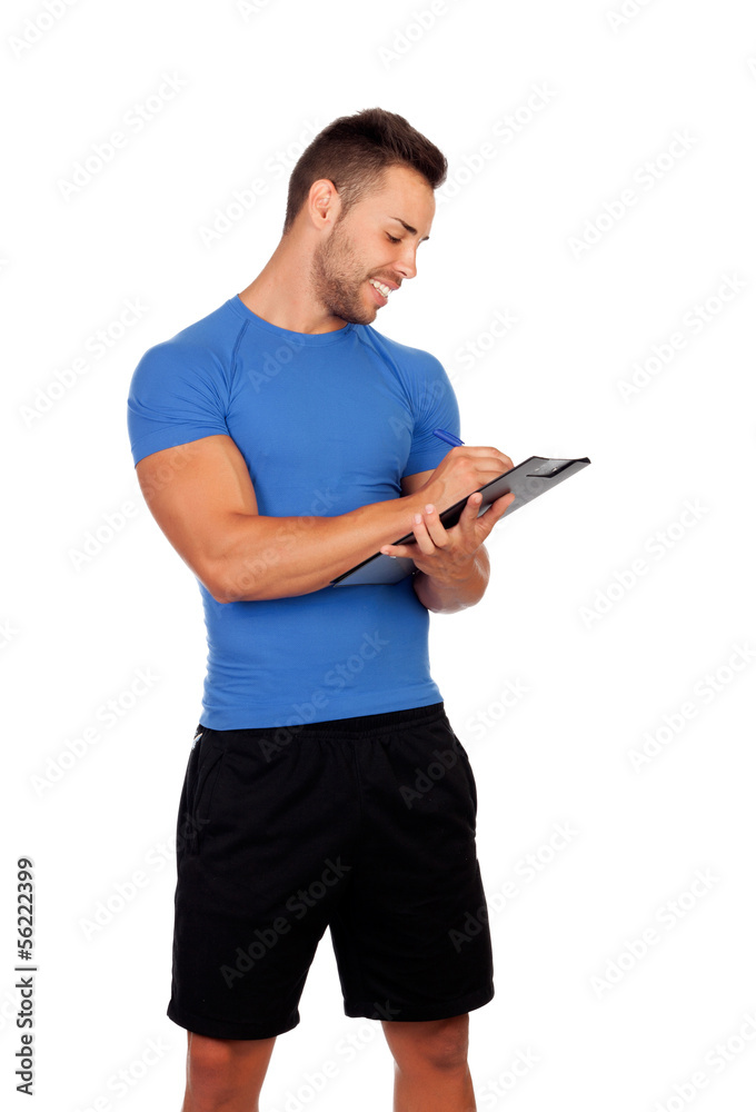 Handsome personal trainer with a clipboard Handsome personal trainer with a clipboard