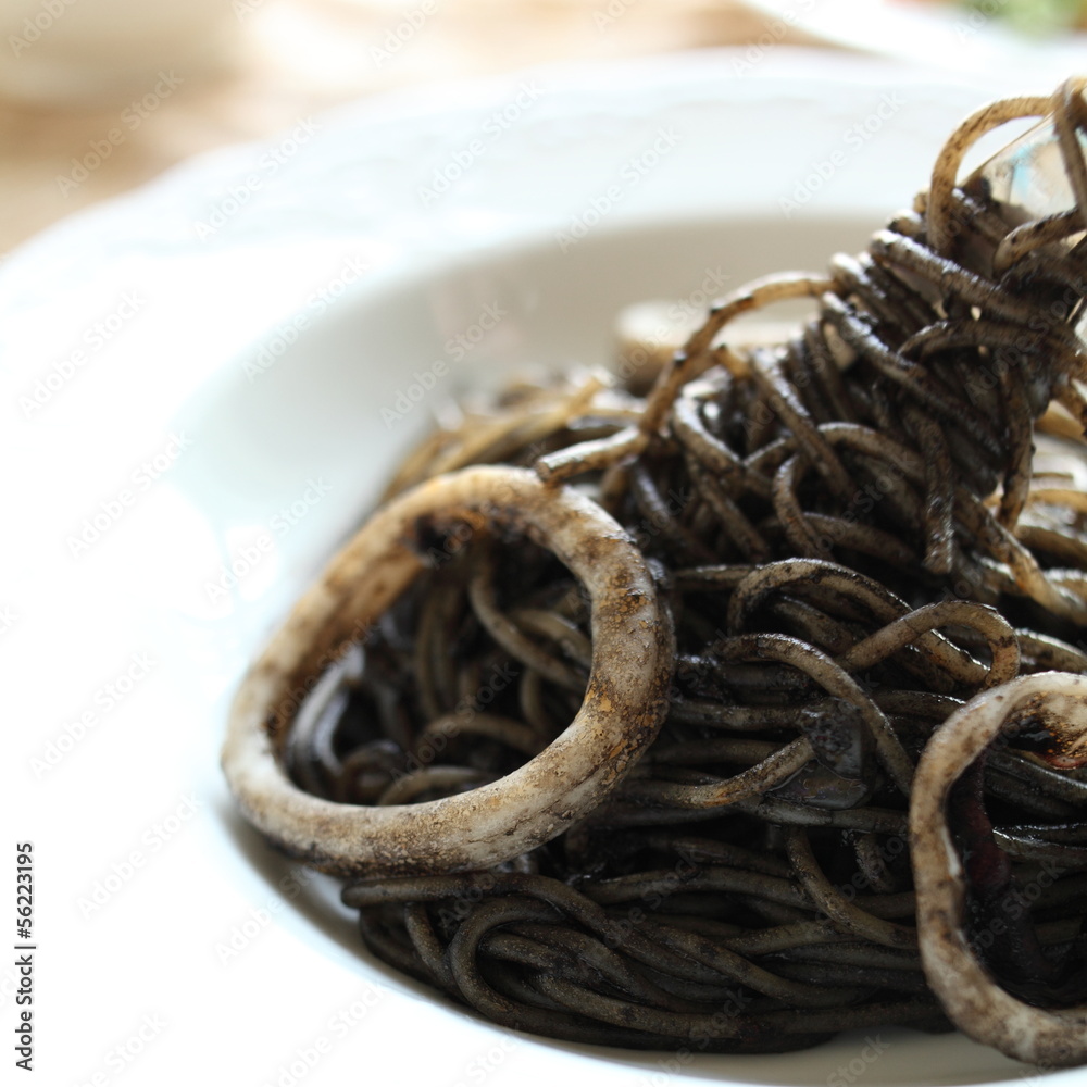 Italian food, squid ink spaghetti Italian food, squid ink spaghetti