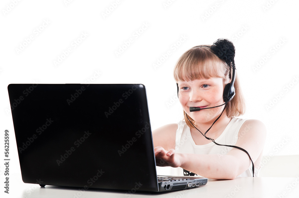 beautiful girl with a laptop and headset beautiful girl with a laptop and headset