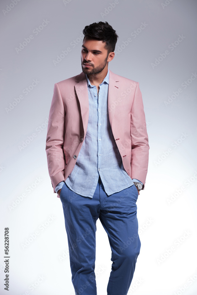 Fototapeta premium casual man with hands in pockets looks away