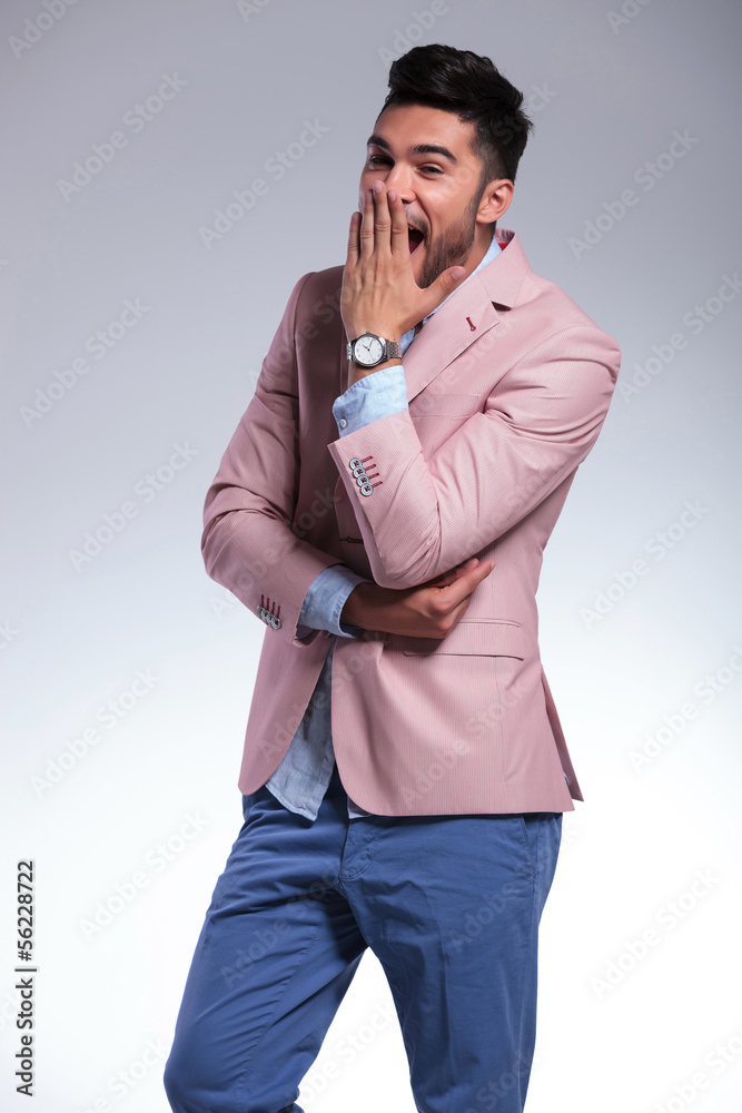 casual man yawning and covering his mouth casual man yawning and covering his mouth