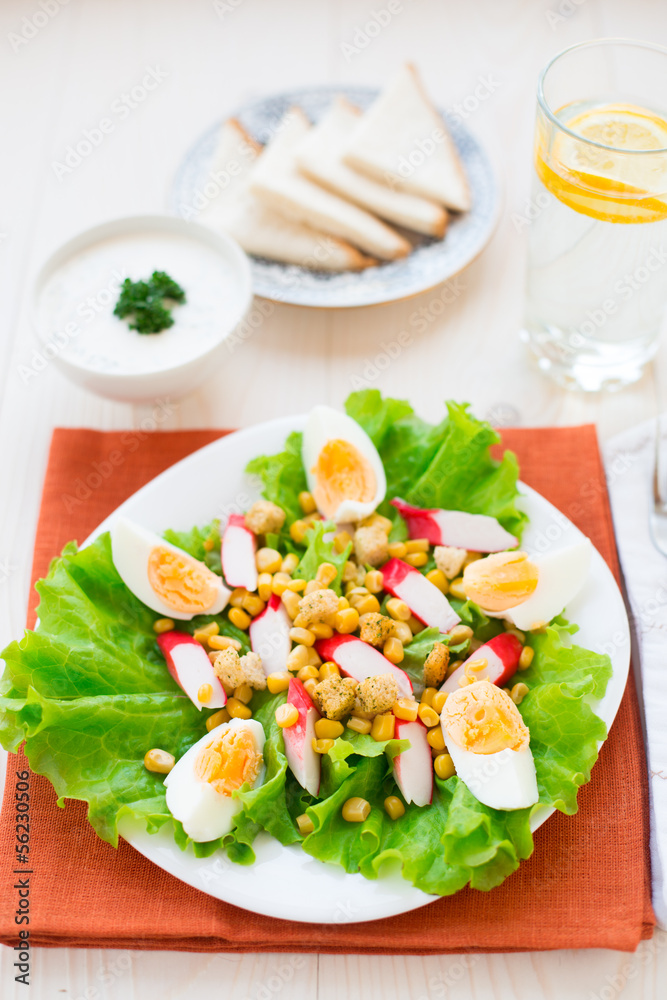 Salad with eggs, crab sticks and corn Salad with eggs, crab sticks and corn