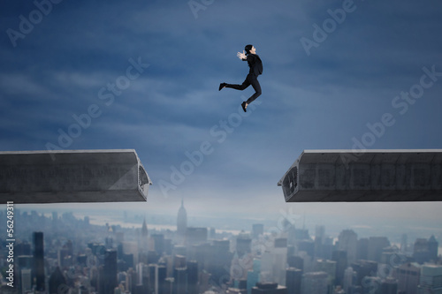 Wallpaper Mural Businesswoman jumping over a gap in the bridge Torontodigital.ca
