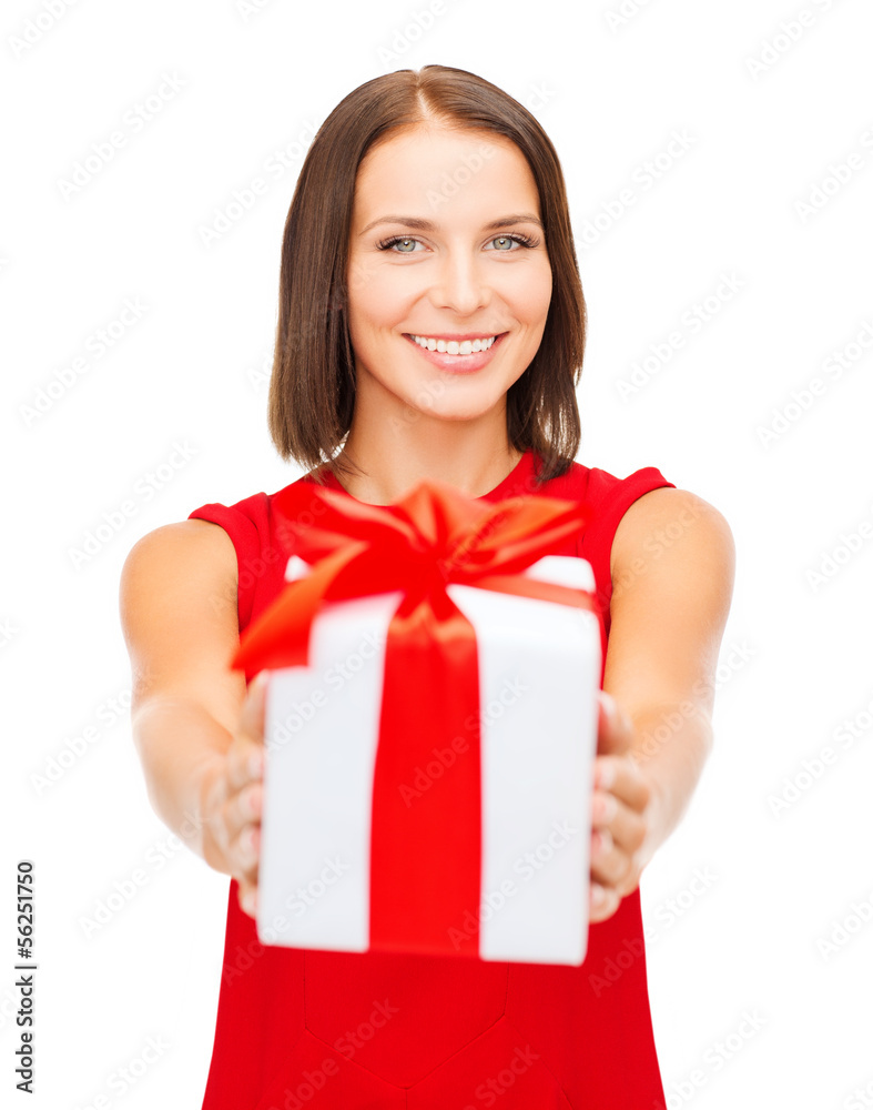 smiling woman in red dress with gift box smiling woman in red dress with gift box