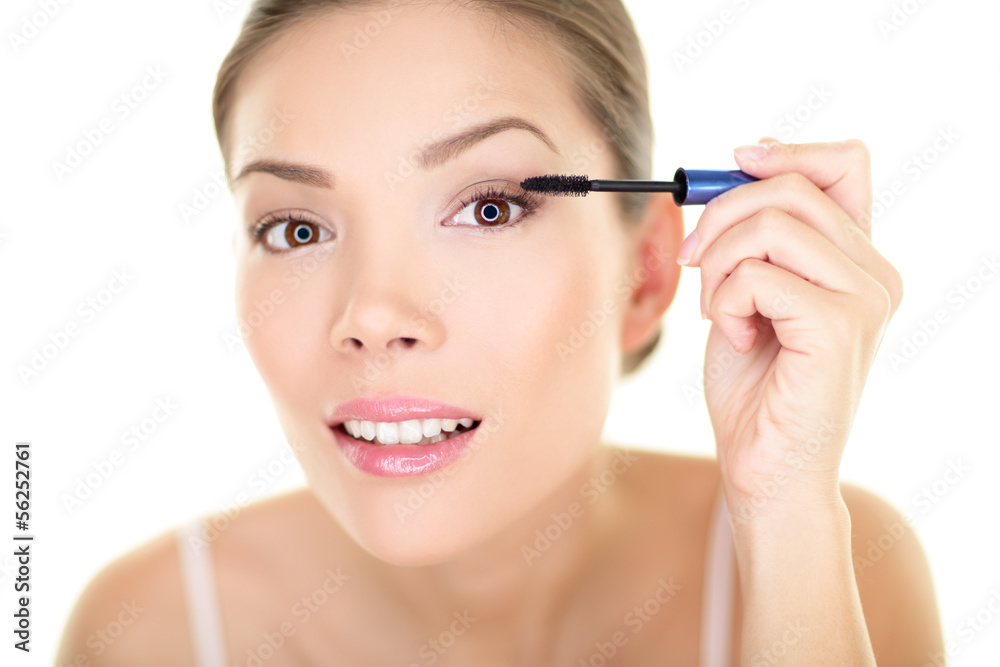 Beauty makeup woman putting mascara eye make up