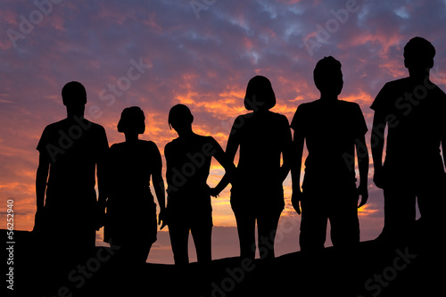 people sillouettes sundown