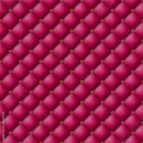 Button-tufted leather background.