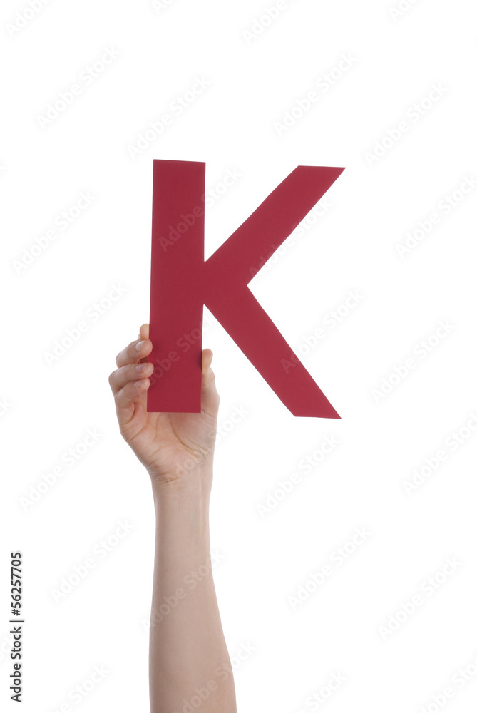 Obraz premium Hand Holding K