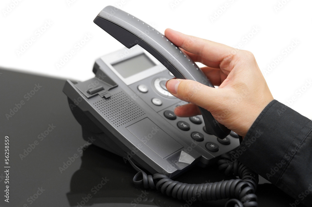 man's hand is picking up the phone man's hand is picking up the phone