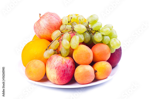 Plate of a tasty fruits isolated on a white background.