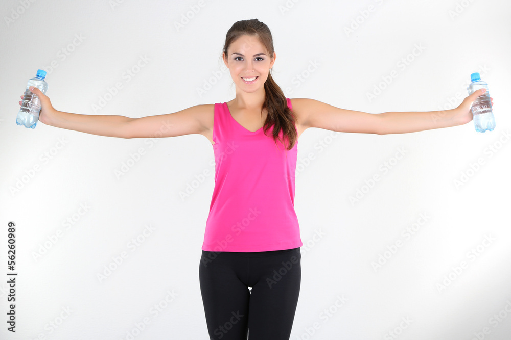 Beautiful young girl doing exercises at home Beautiful young girl doing exercises at home
