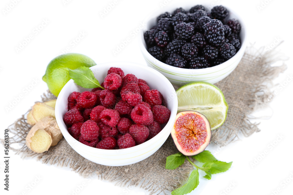 Raspberries and blackberry in small bowls Raspberries and blackberry in small bowls