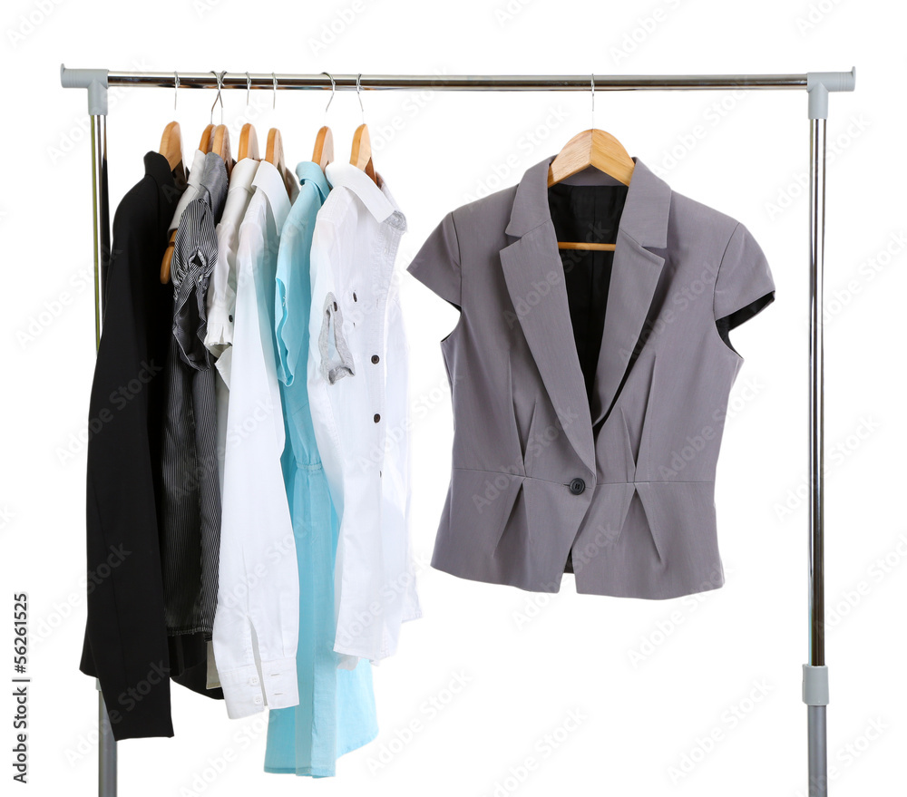 Office clothes on hangers, isolated on white Office clothes on hangers, isolated on white