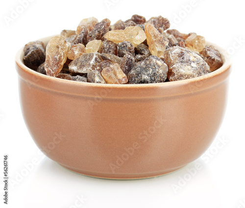 Caramelized sugar in bowl isolated on white