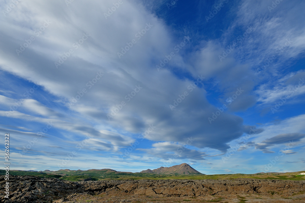 Iceland - clouds and blue sky landscape on  the lava