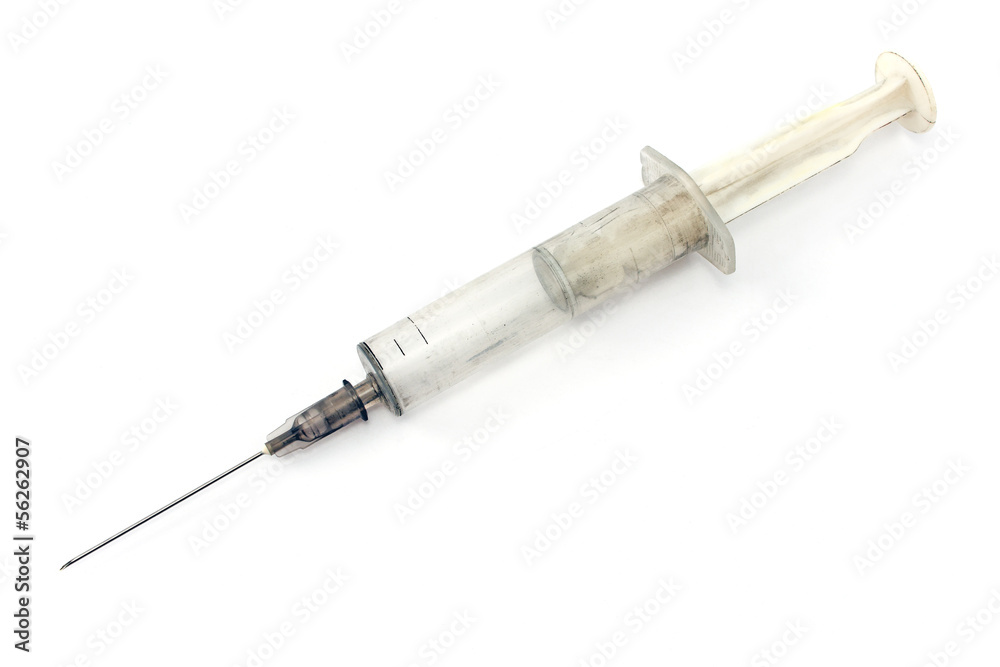 Dirty used glass syringe isolated on white Dirty used glass syringe isolated on white