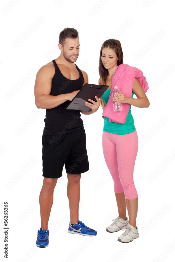 Handsome personal trainer with a attractive girl Handsome personal trainer with a attractive girl