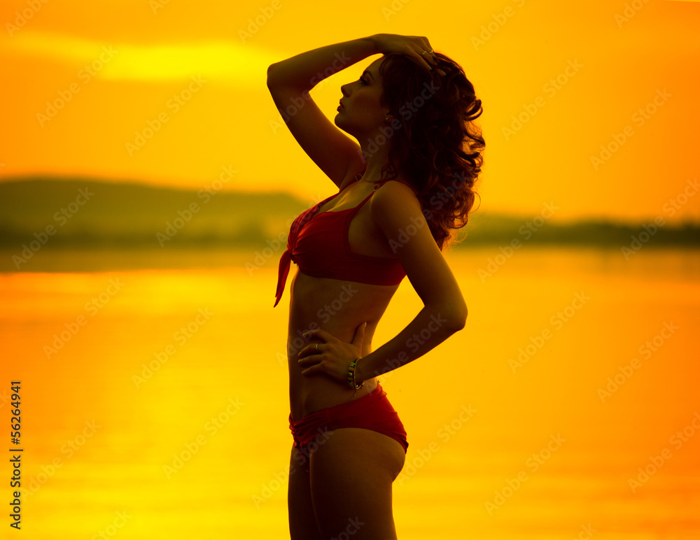 Fototapeta premium Portrait of brunette woman posing in profile