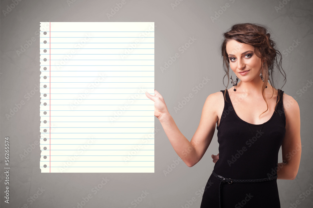 Young woman holding white paper copy space with diagonal lines Young woman holding white paper copy space with diagonal lines