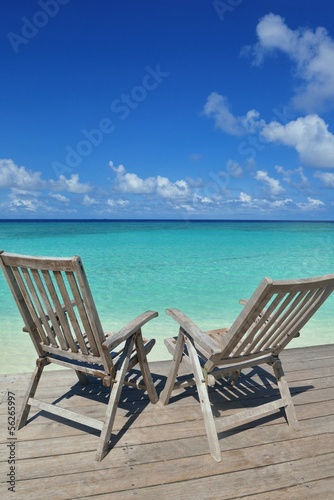 tropical beach chairs © .shock