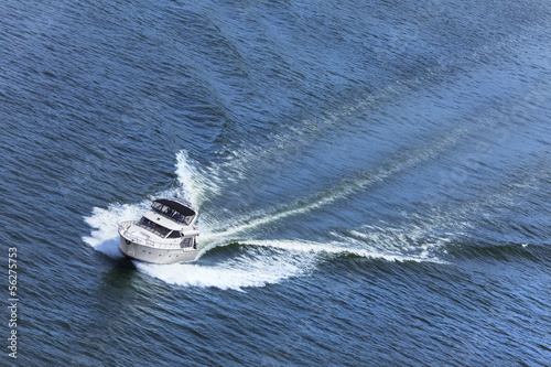 Luxury Power Boat Yacht on Blue Sea © spotmatikphoto