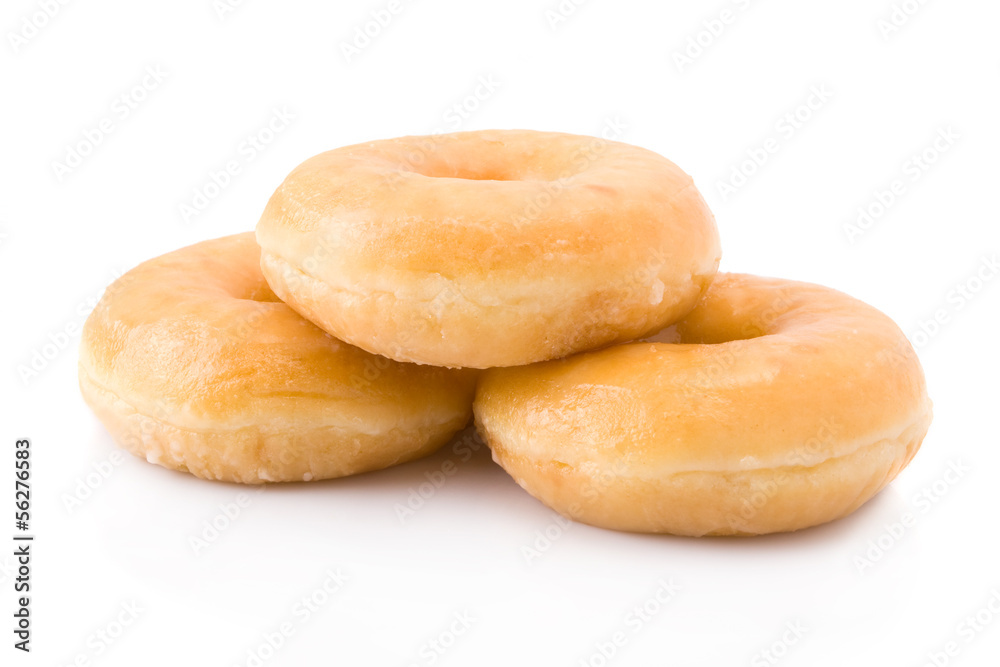 Three doughnuts or donuts piled isolated on white. Three doughnuts or donuts piled isolated on white.