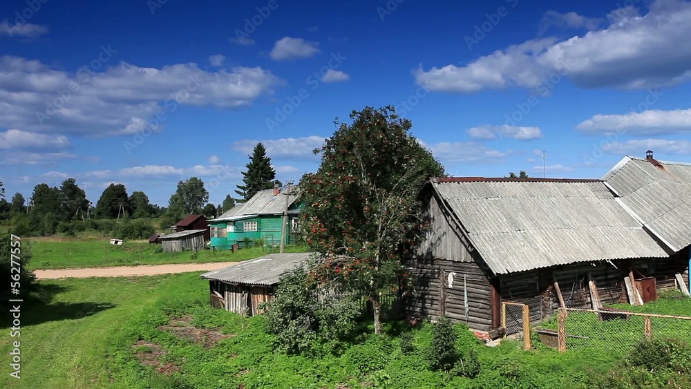 Movement of clouds over the old Russian wooden houses. Dvorets, Movement of clouds over the old Russian wooden houses. Dvorets,