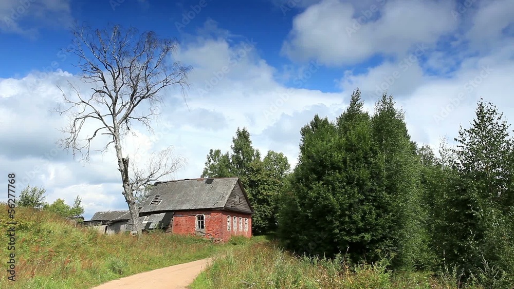Movement of clouds over the old Russian wooden houses. Dvorets, Movement of clouds over the old Russian wooden houses. Dvorets,