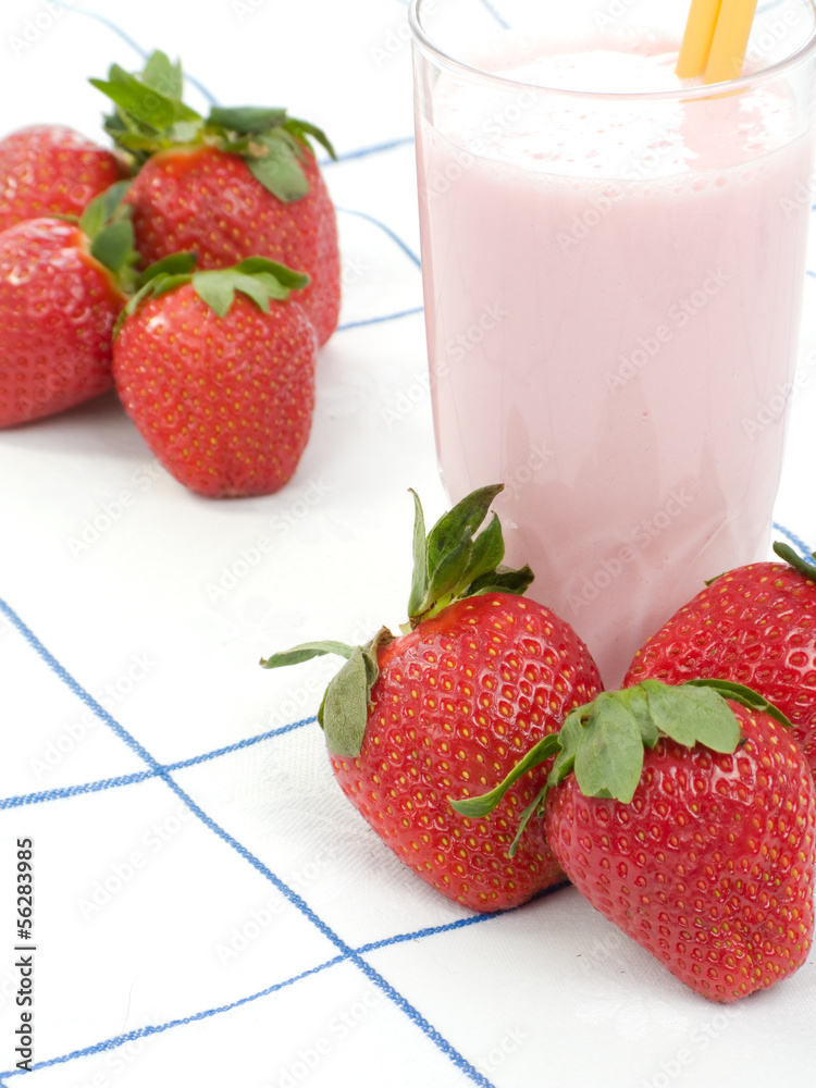 Smoothie made with strawberries in a table cloth
