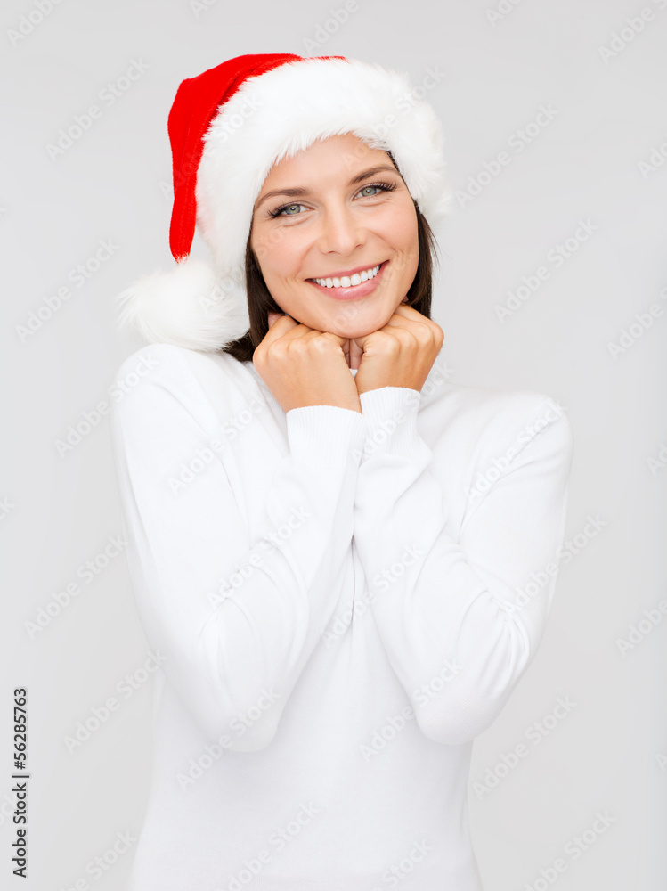 smiling woman in santa helper hat smiling woman in santa helper hat