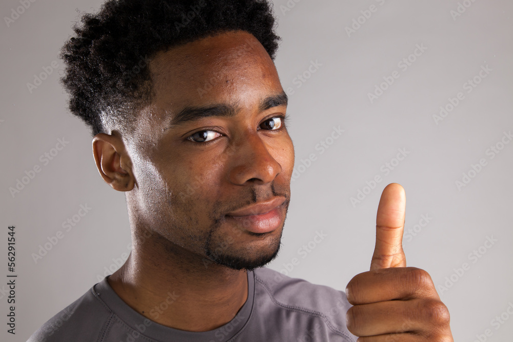 Attractive afro-american man posing in studio Attractive afro-american man posing in studio
