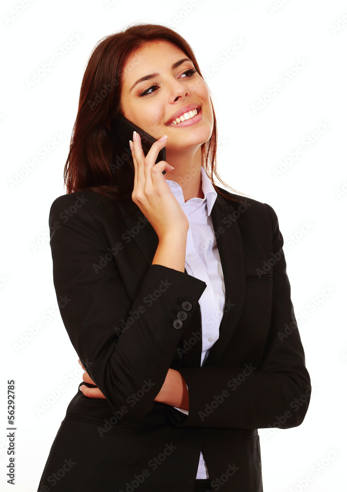 Happy businesswoman talking on phone and looking at copyspace Happy businesswoman talking on phone and looking at copyspace