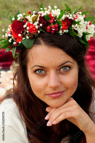 young beautiful girl with wreath