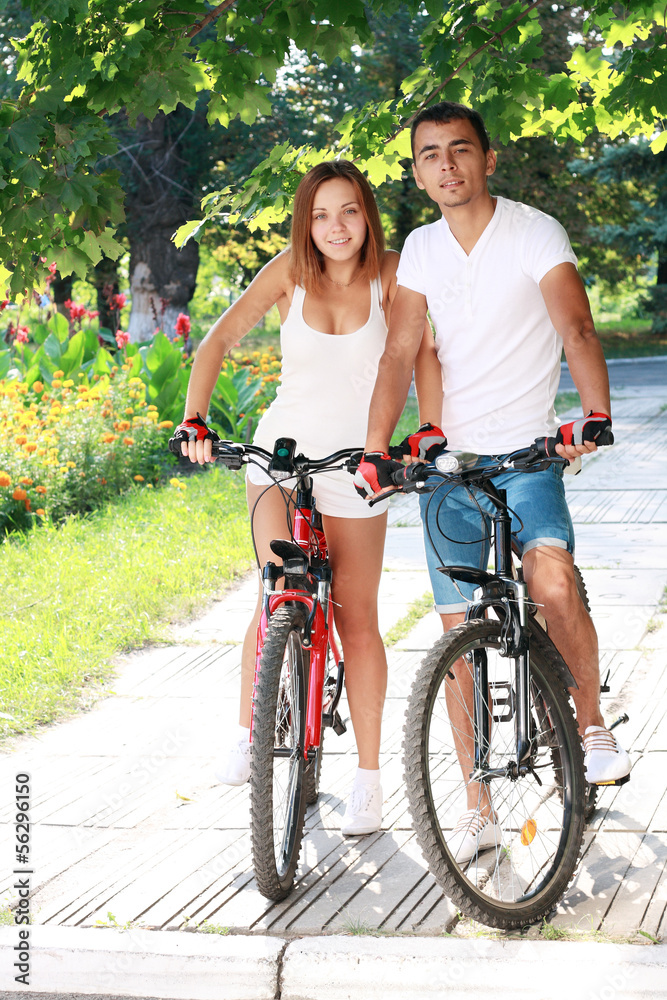 Obraz premium couple with their bikes