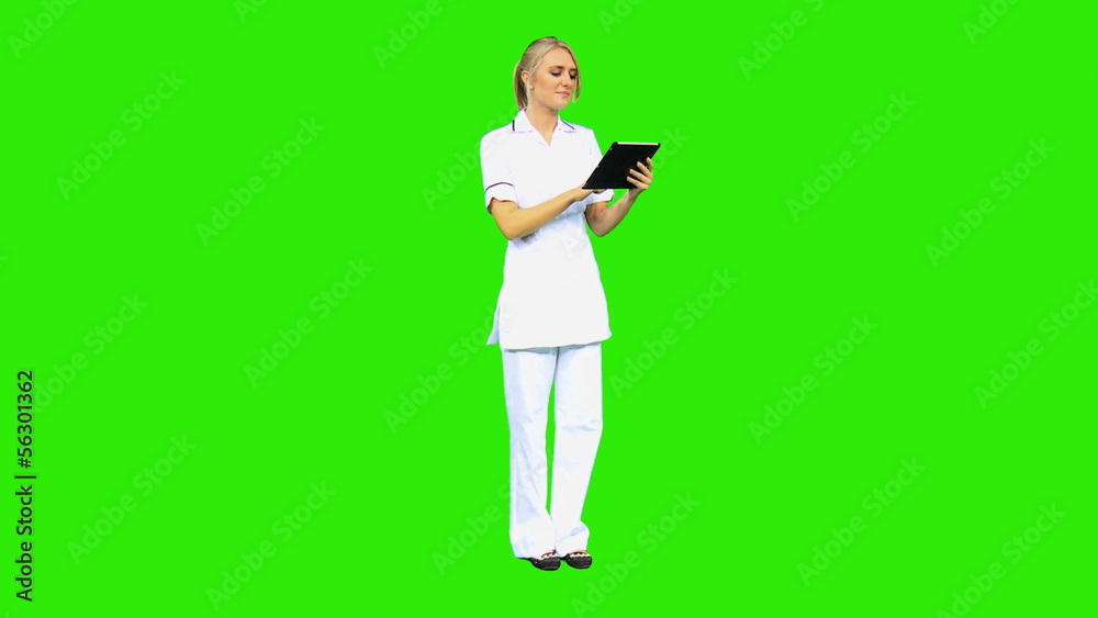 Caucasian Female Nursing Assistant Wireless Tablet Green Screen Caucasian Female Nursing Assistant Wireless Tablet Green Screen