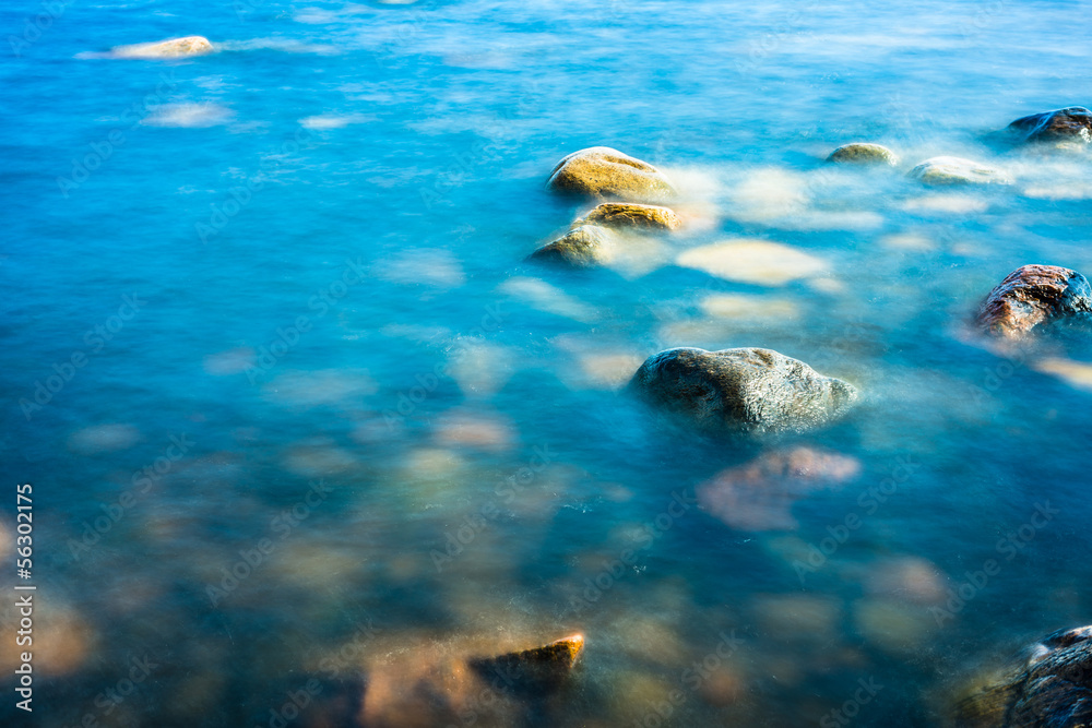 Fototapeta premium Rock in the still water