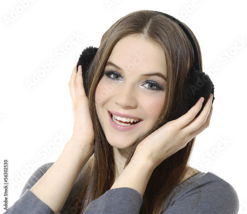 girl is a music lover, long straight hair girl in ear-phones