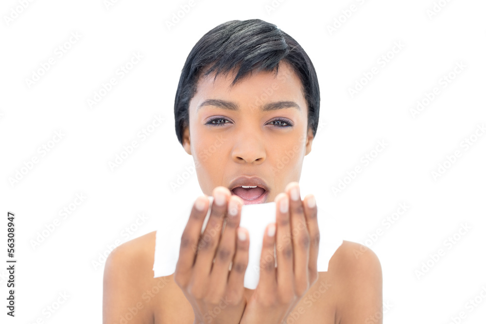 Black haired model about to sneeze Black haired model about to sneeze