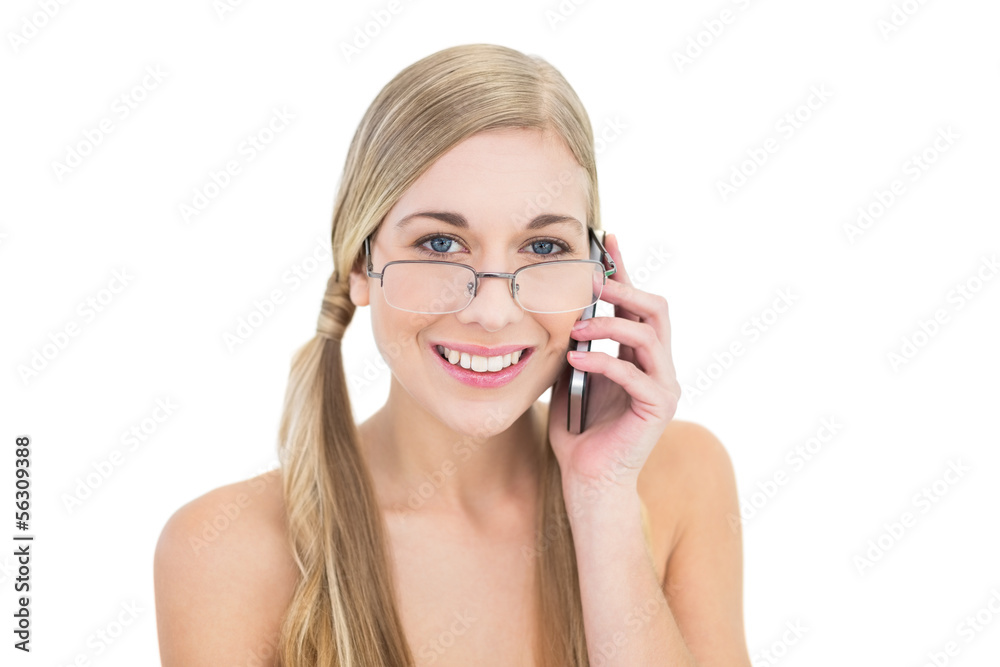 Concentrated young blonde woman making a phone call Concentrated young blonde woman making a phone call