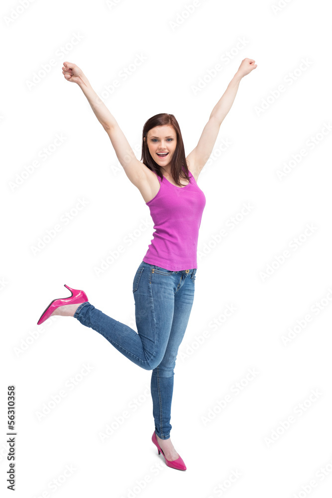 Happy stylish brunette wearing high shoes cheering up Happy stylish brunette wearing high shoes cheering up