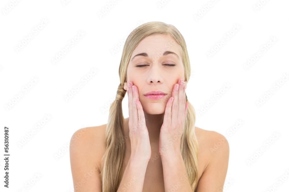 Natural young blonde woman posing with closed eyes Natural young blonde woman posing with closed eyes