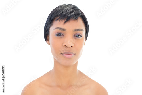 Beautiful black haired woman posing looking at camera