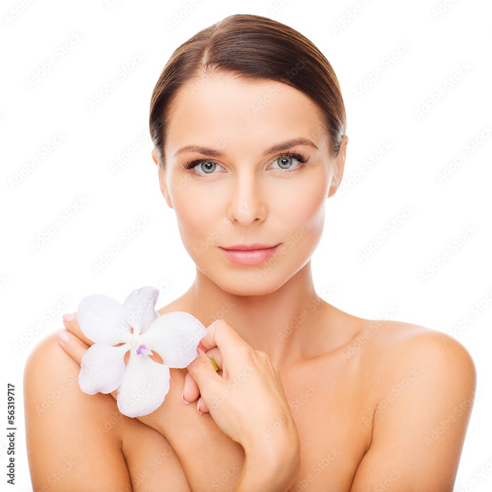 relaxed woman with orhid flower relaxed woman with orhid flower
