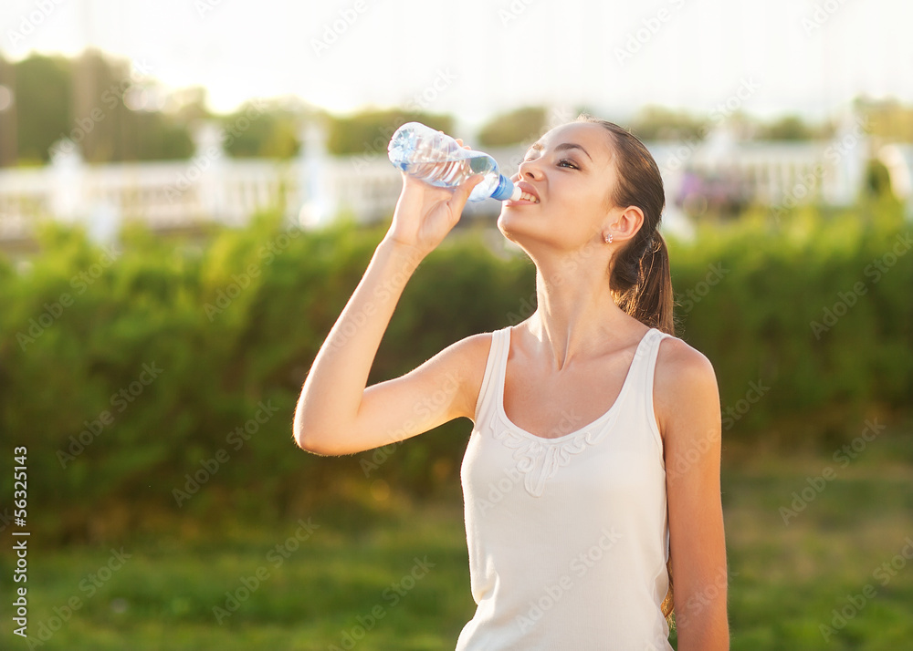 Portrait half face of young woman drink water Portrait half face of young woman drink water