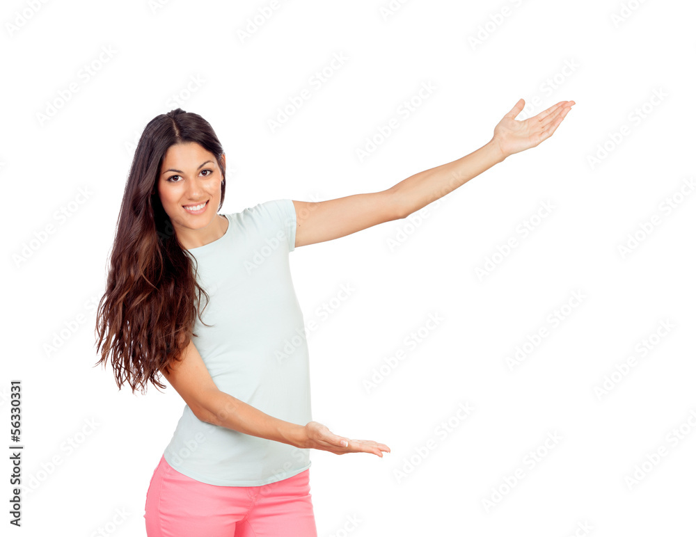 Pretty girl with pink pants showing something with her arms Pretty girl with pink pants showing something with her arms