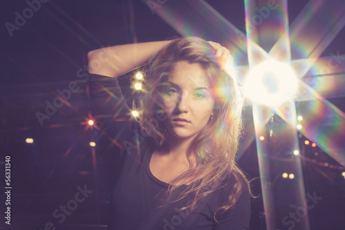beautiful 20s girl on night city background © mettus