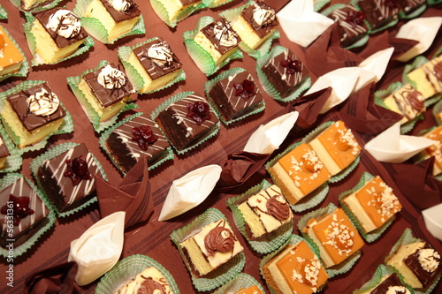 Varieties of cakes desserts catering sweets © Voyagerix