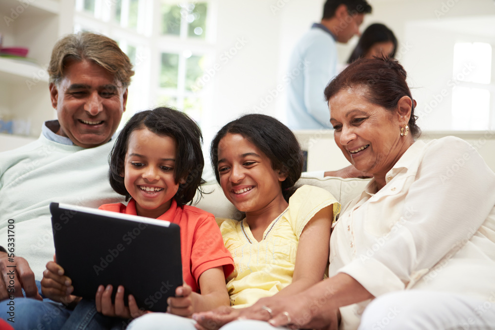 Multi-Generation Indian Family With Digital Tablet Multi-Generation Indian Family With Digital Tablet