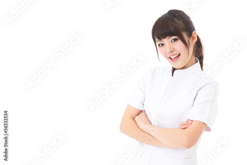 young asian nurse on white background © taka